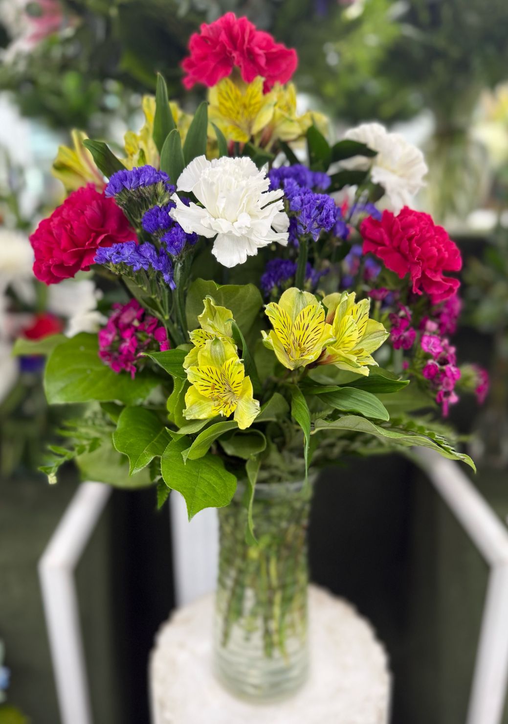 BRIGHT PINK AND YELLOW ARRANGEMENT IN THE COOLER