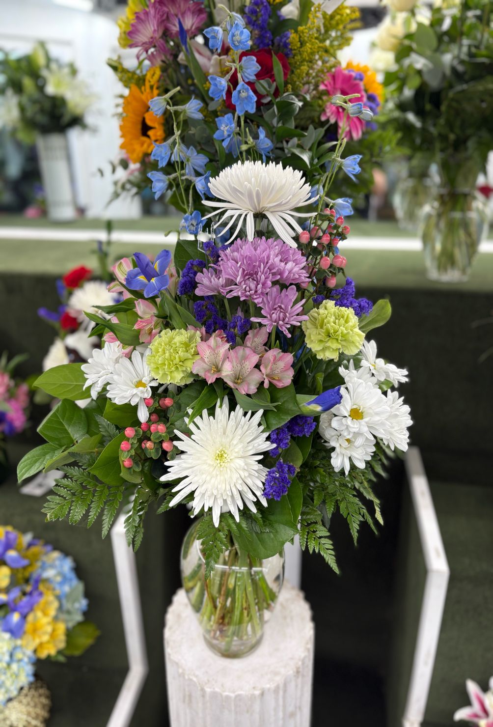White and Purple Arrangement IN THE COOLER 