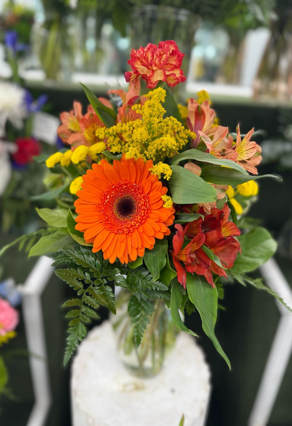 BRIGHT YELLOW AND ORANGE ARRANGEMENT IN THE COOLER
