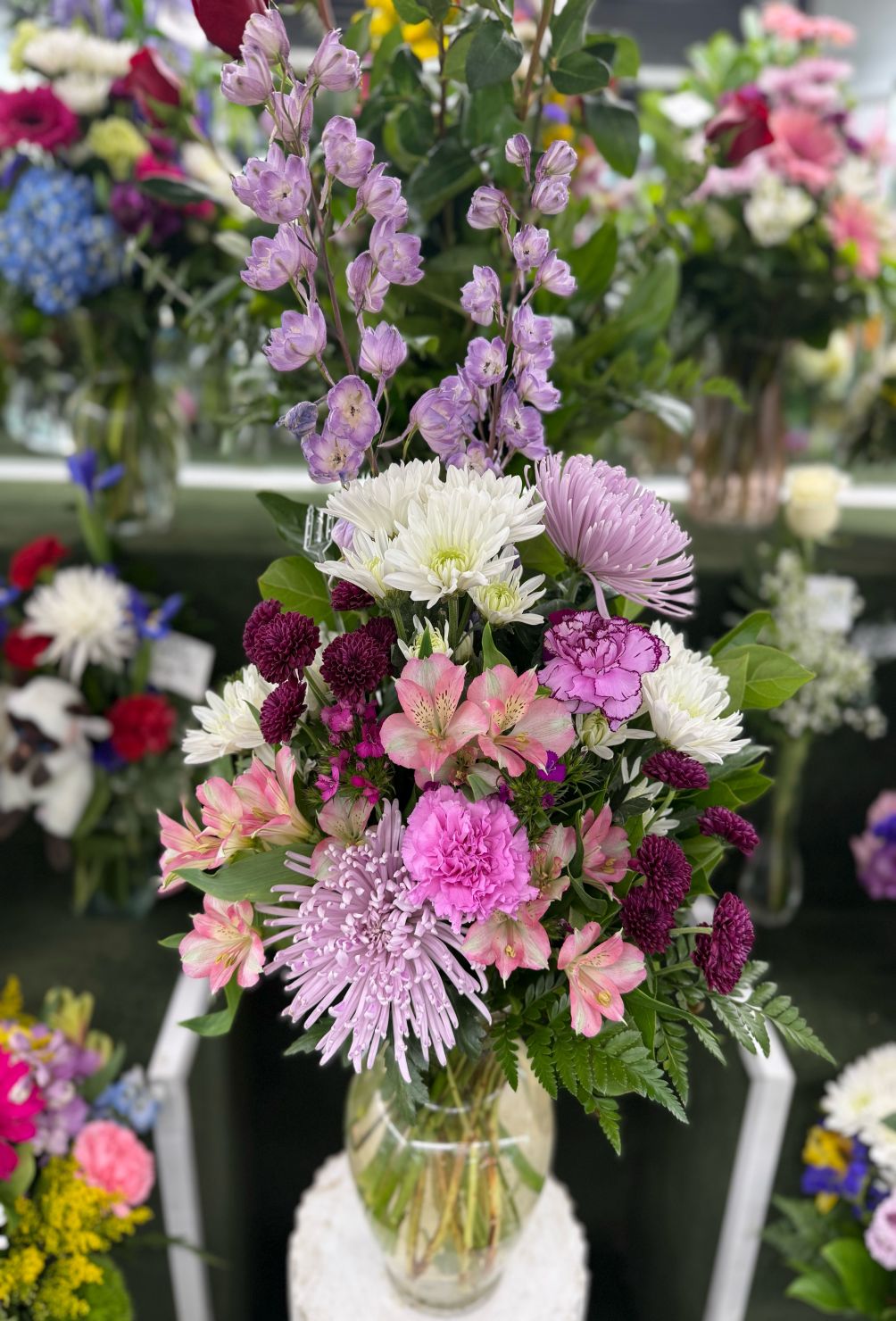 PINK AND PURPLE ARRANGEMENT IN THE COOLER