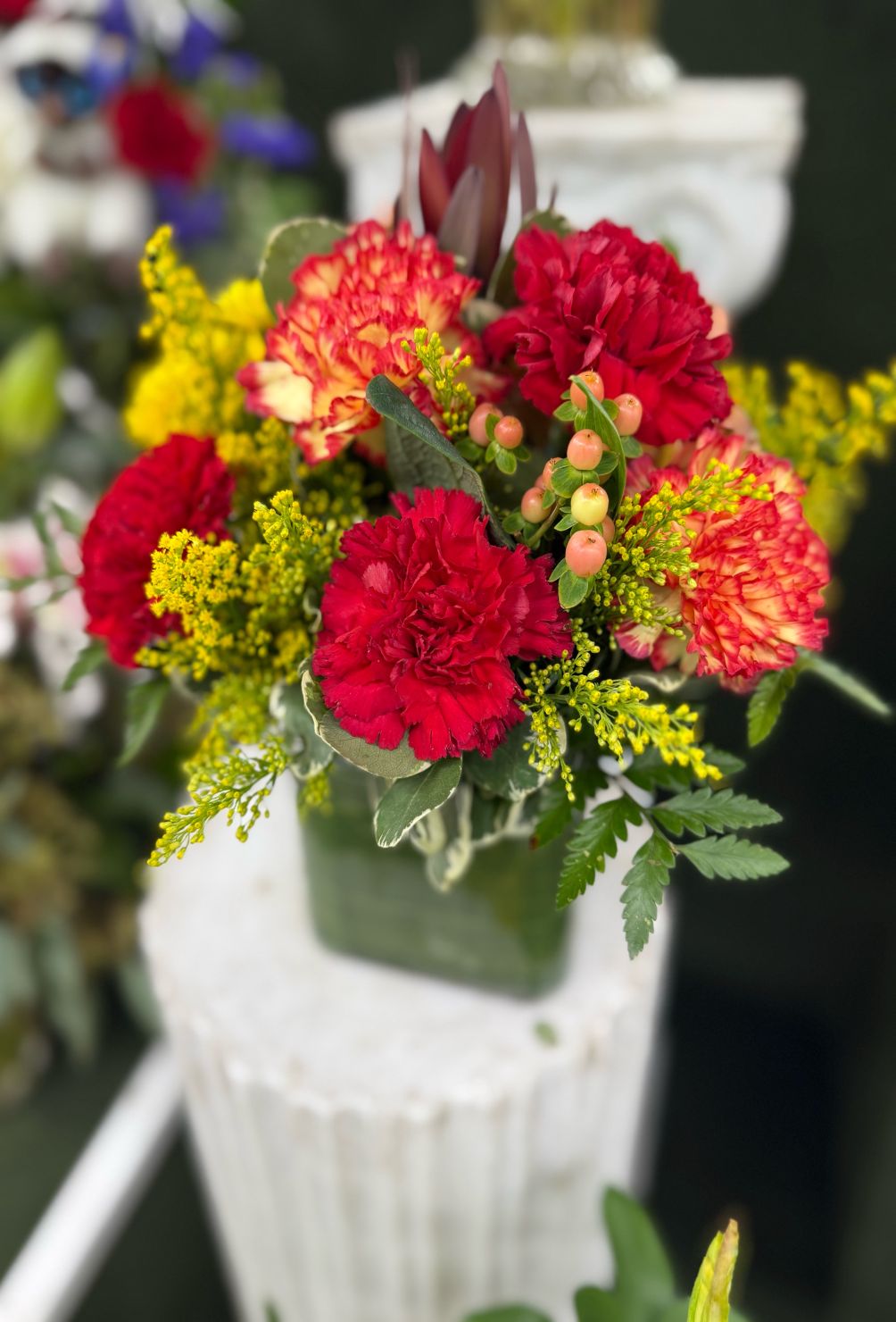 FALL CARNATION CUBE ARRANGEMENT IN THE COOLER
