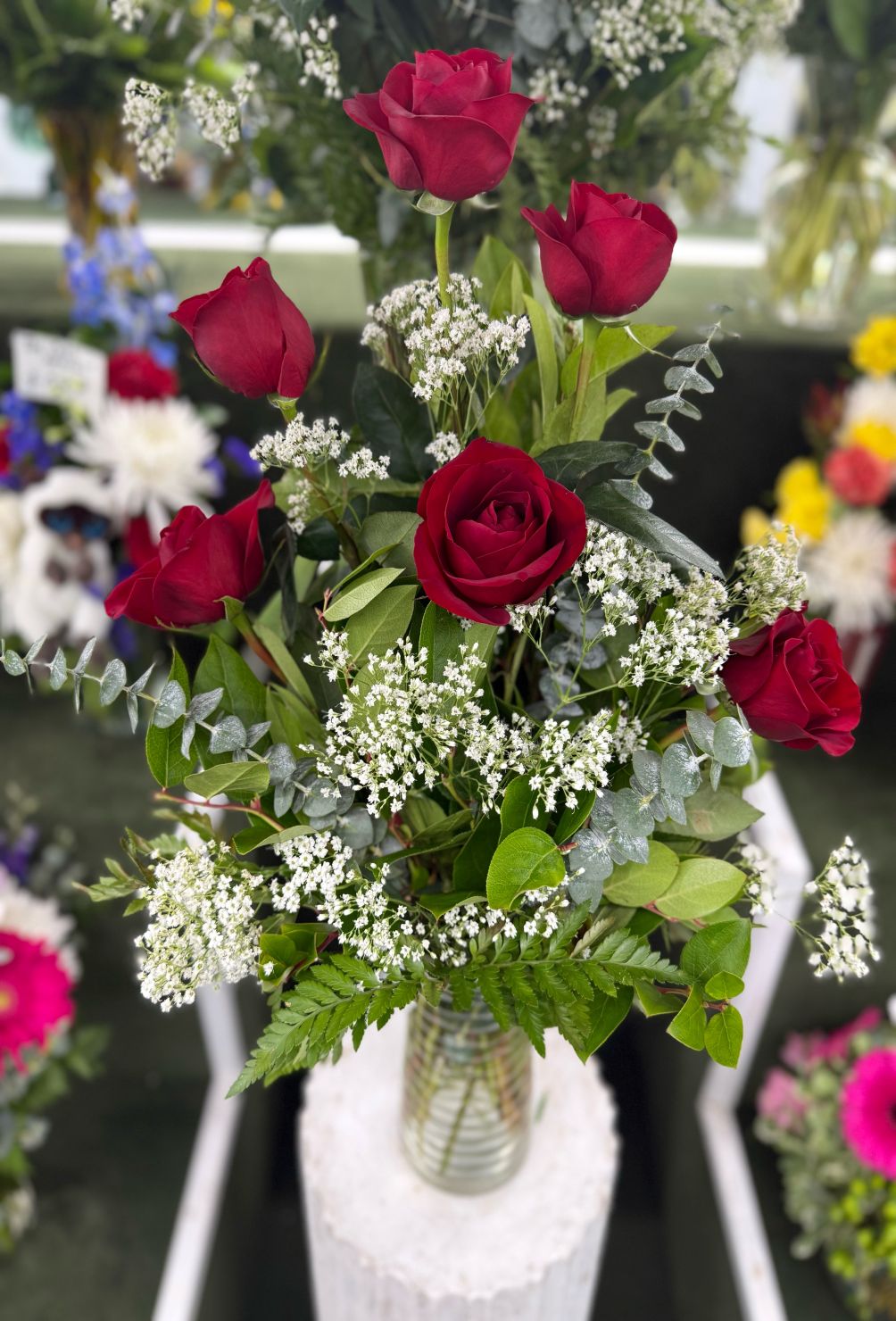 HALF A DOZEN RED ROSES ARRANGEMENT IN THE COOLER