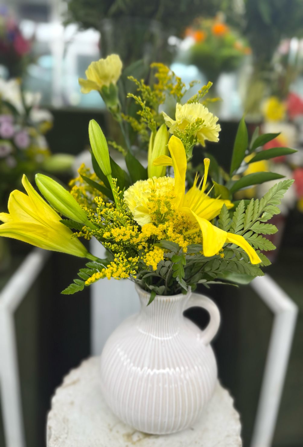 YELLOW SUNSHINE ARRANGEMENT IN THE COOLER