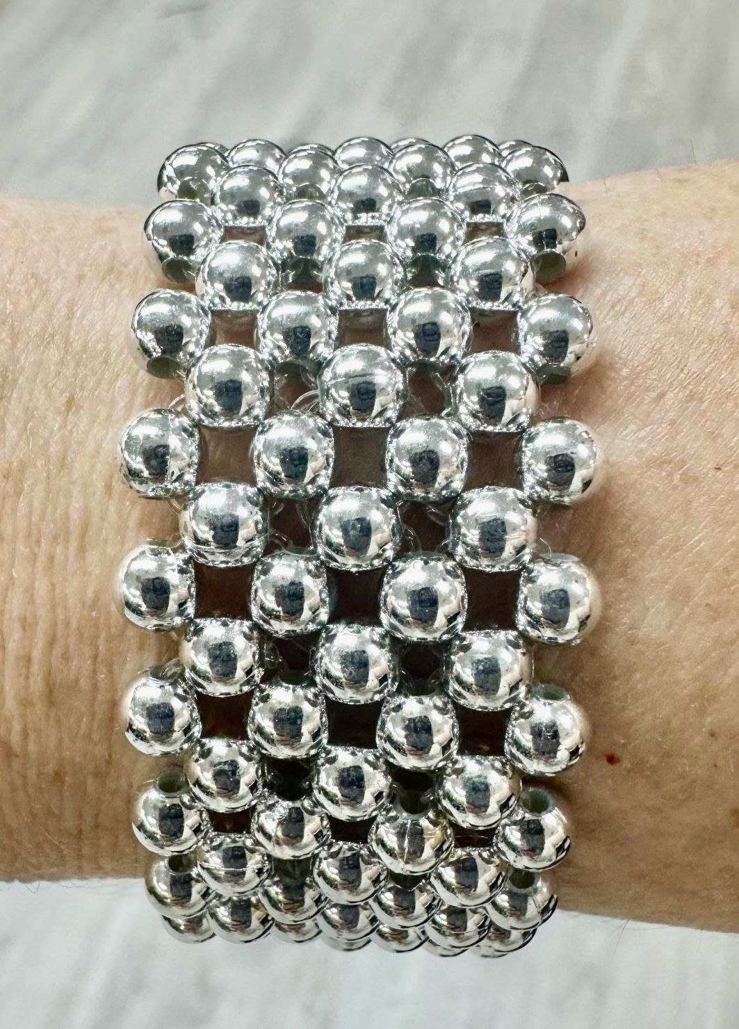 L- Silver Beaded