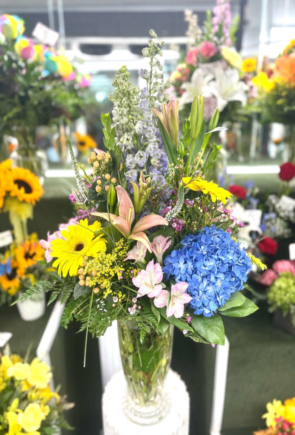 Tall Mix With Blue Arrangement In the Cooler