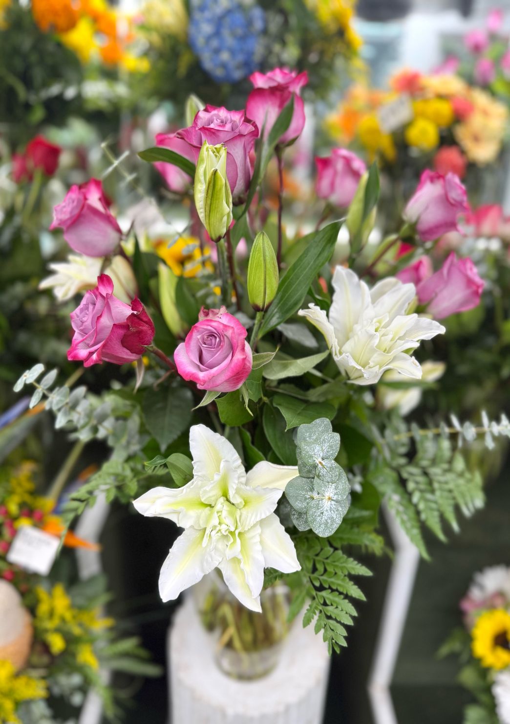 Dozen Lavender Roses and White Lillies In the Cooler