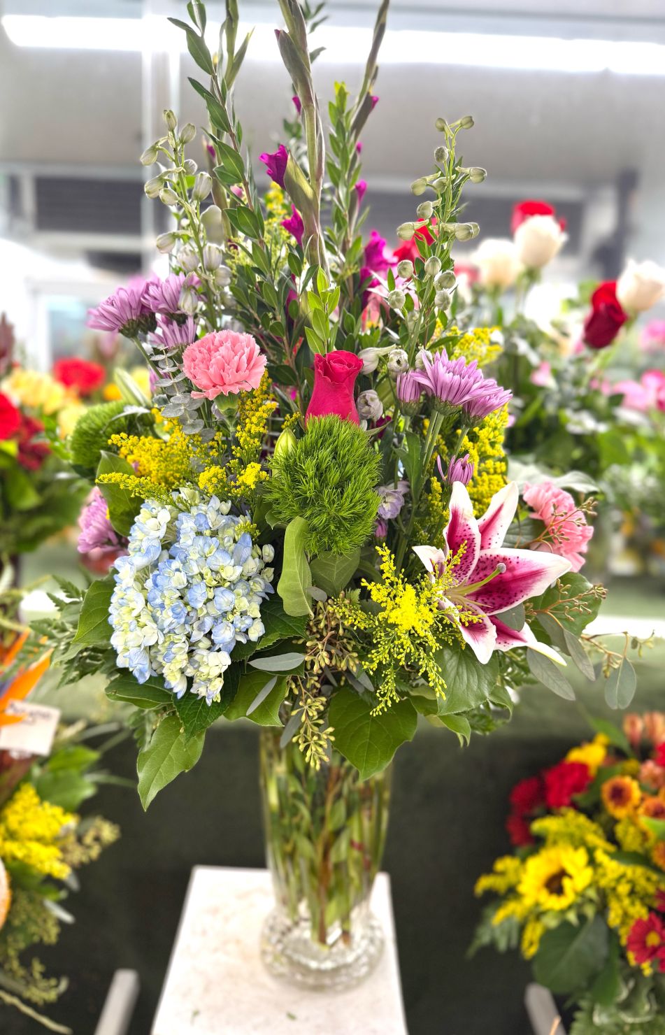 Colorburst Blooms Arrangement In the Cooler 