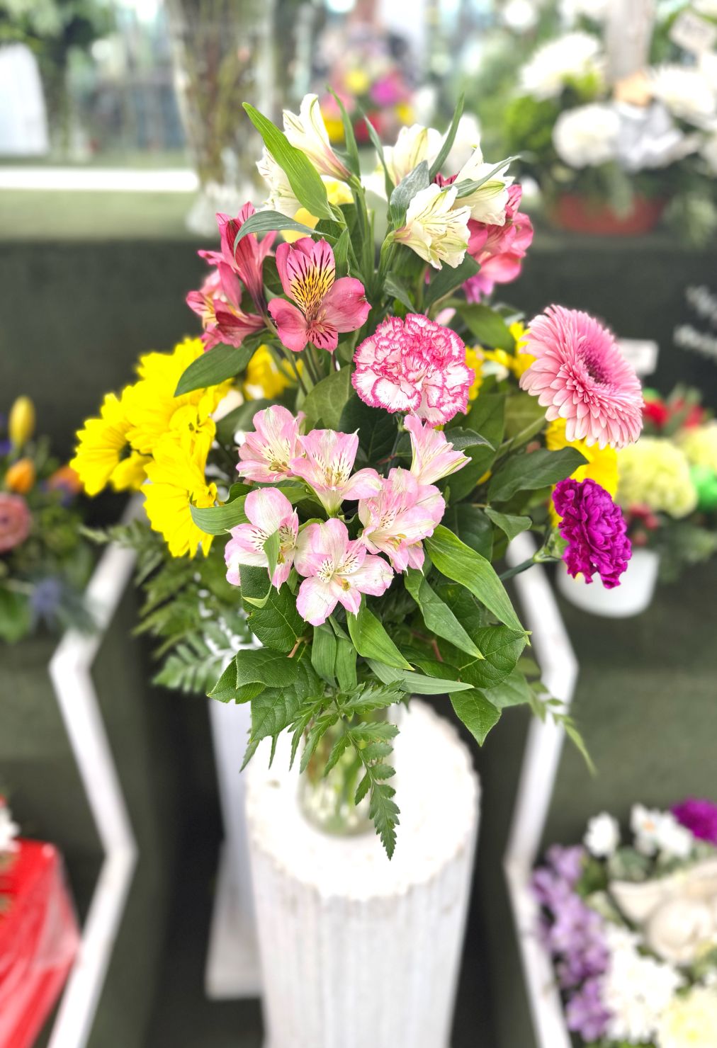 Cheerful Charm Arrangement In The Cooler