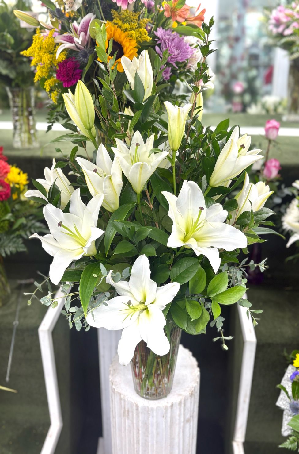 White Lily Arrangement In the Cooler