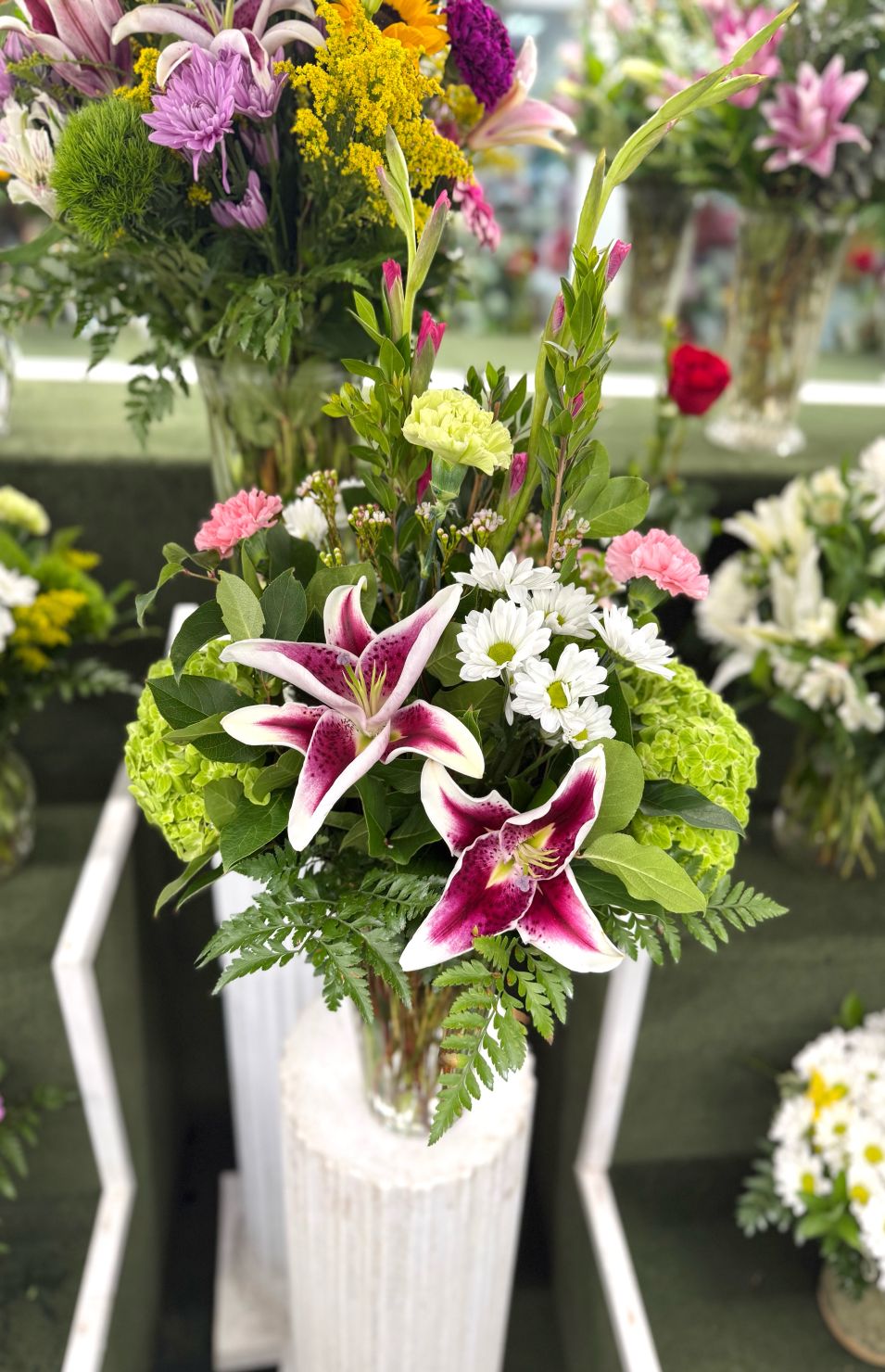 A Touch of Lily Arrangement In the Cooler
