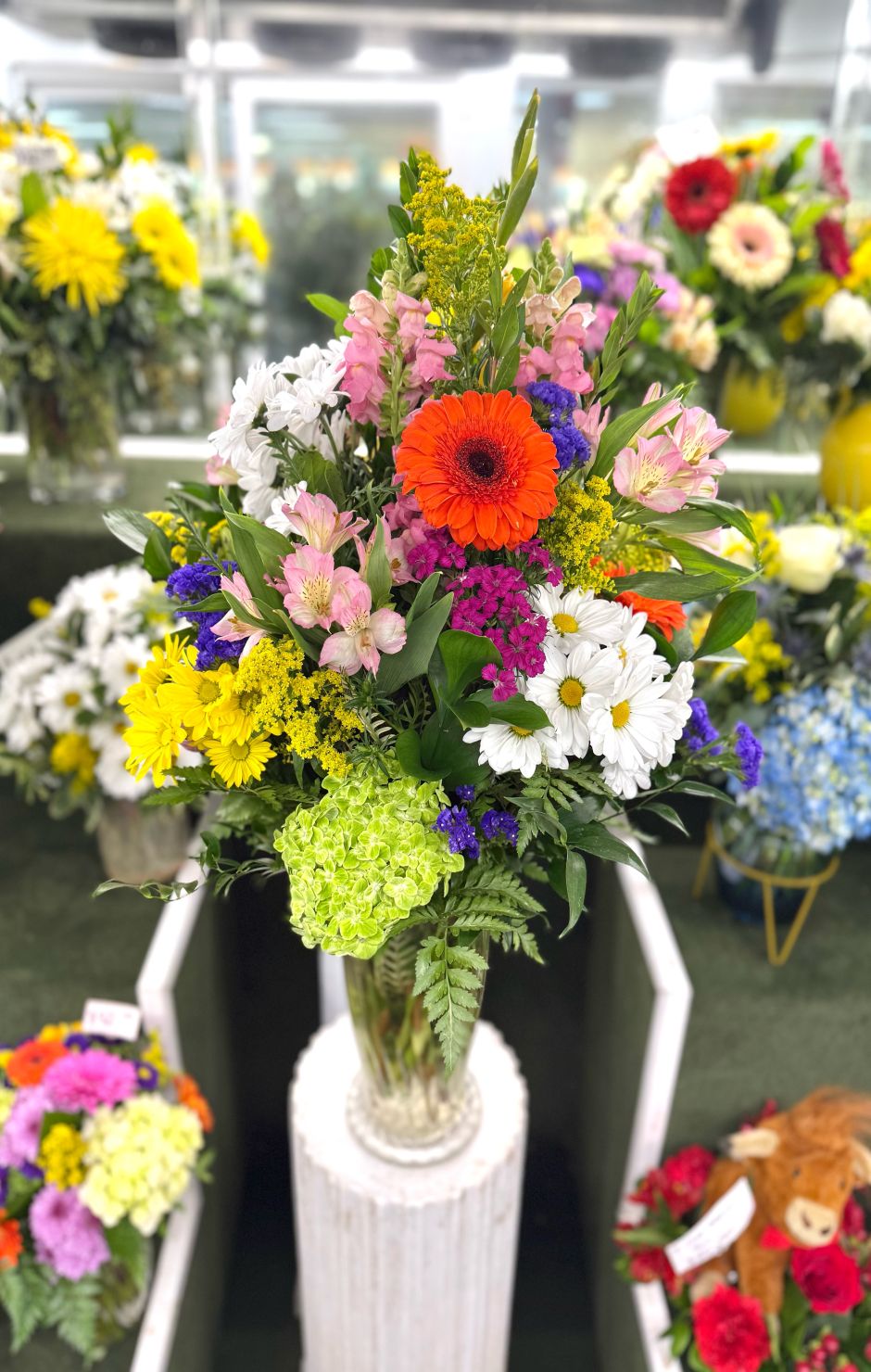 Blussful Blossoms Arrangement In the Cooler