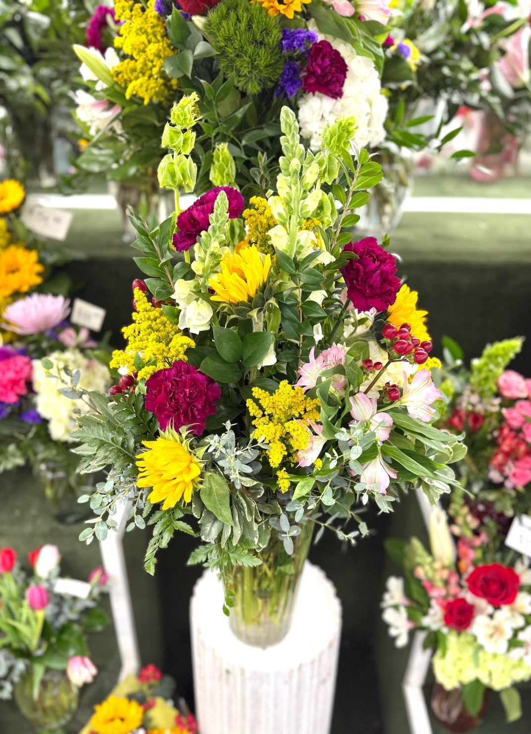 Blossoming Blooms Arrangement In the Cooler