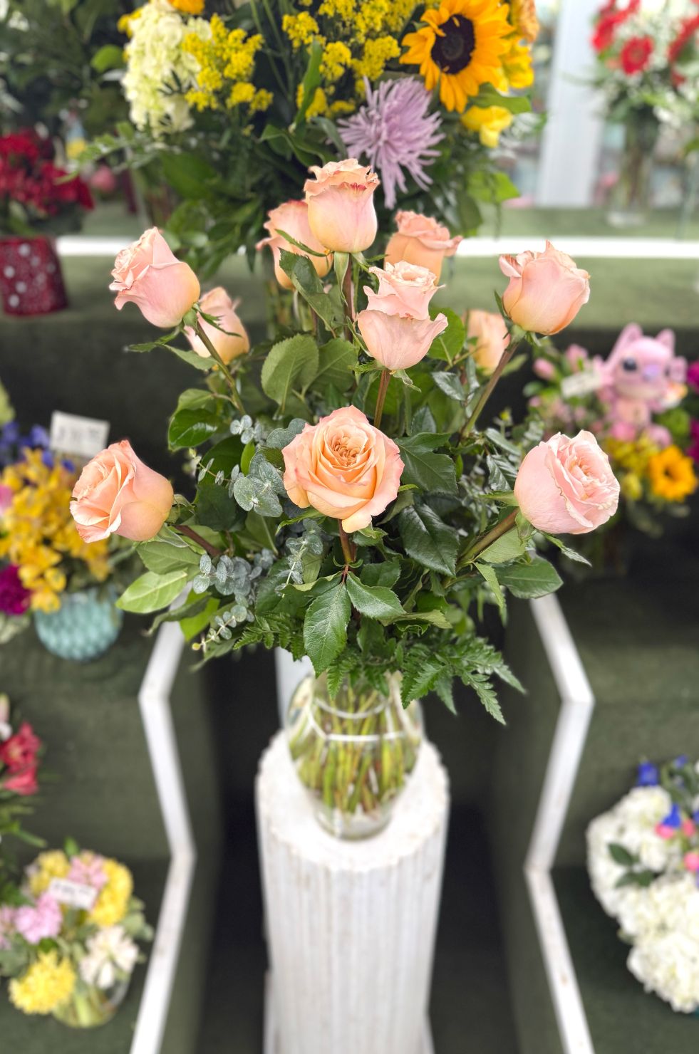 Dozen Peach Roses Arrangement In the Cooler