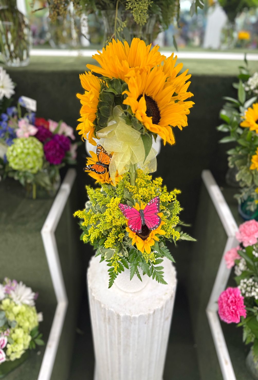 Sunflower Topiary Arrangement In the Cooler
