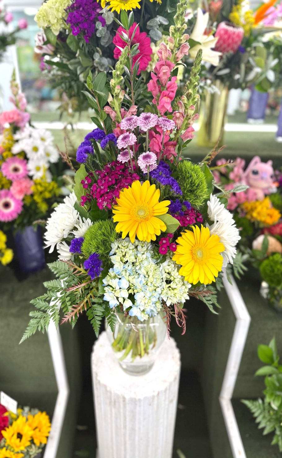 Wildflower Radiance Arrangement In the Cooler
