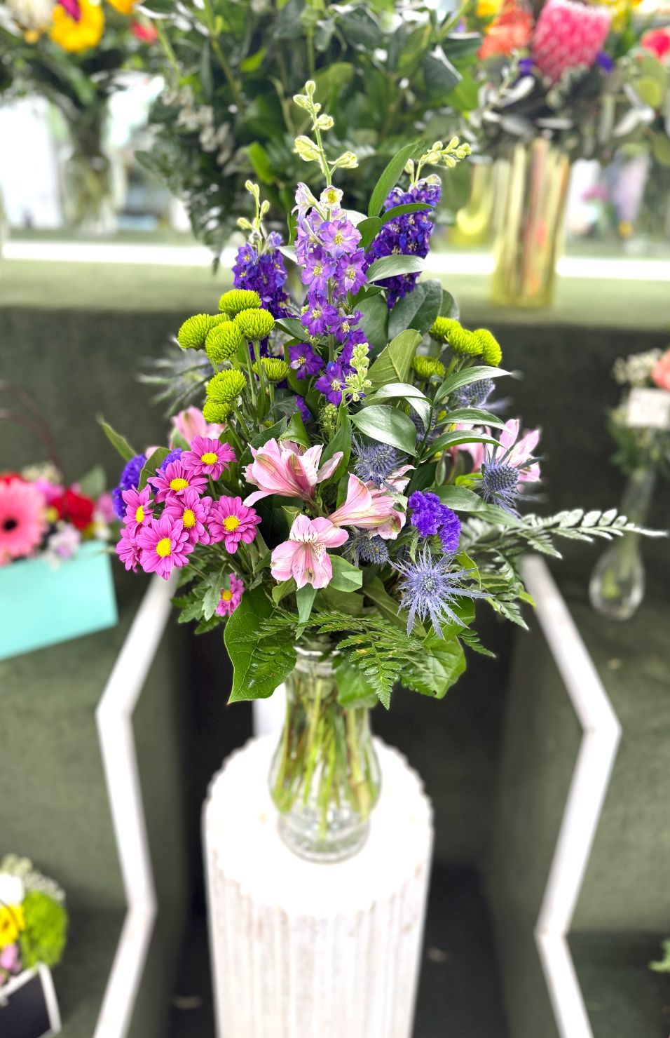 Positively Purple Arrangement In the Cooler