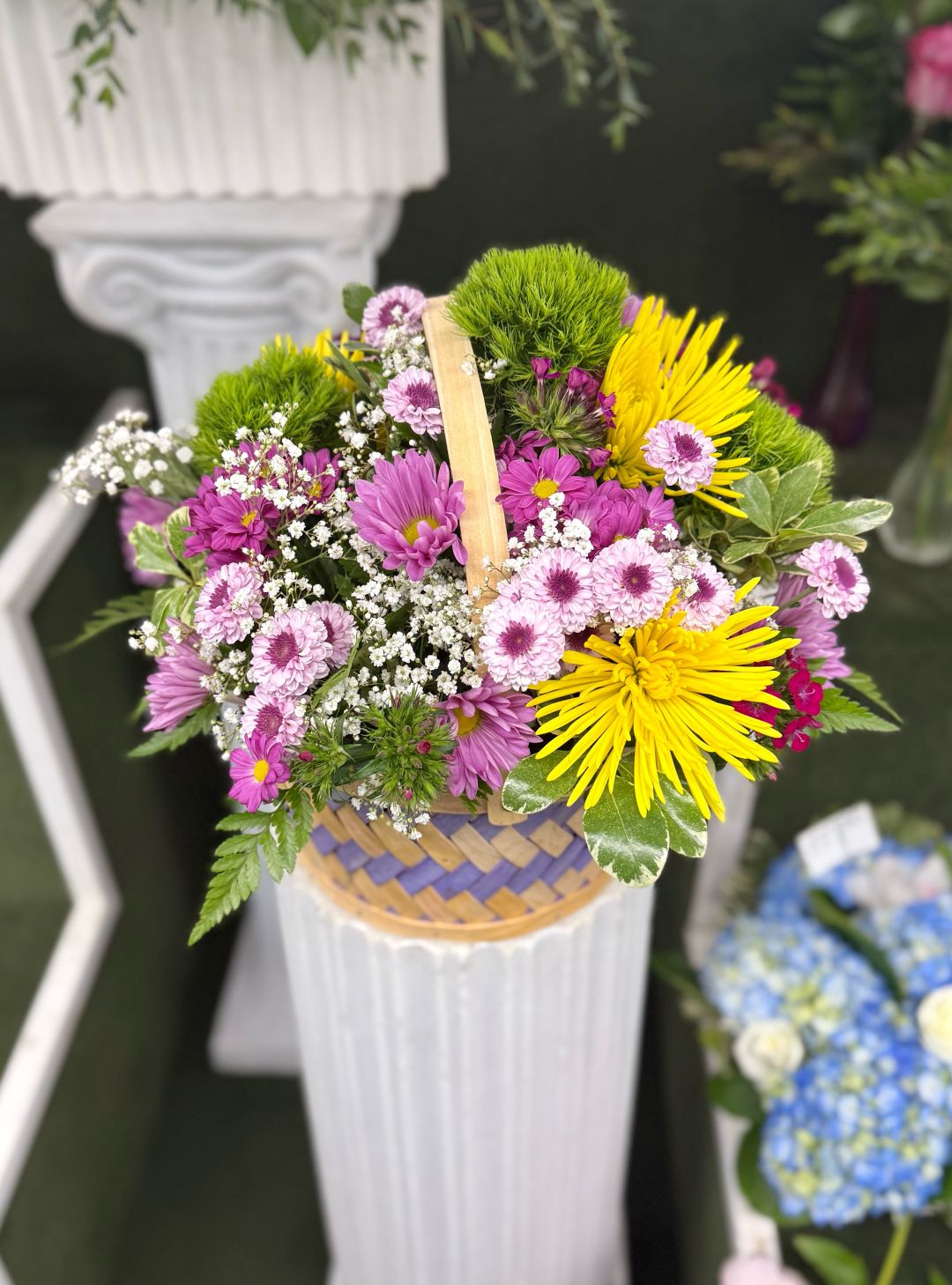 Basket Bliss Arrangement In the Cooler
