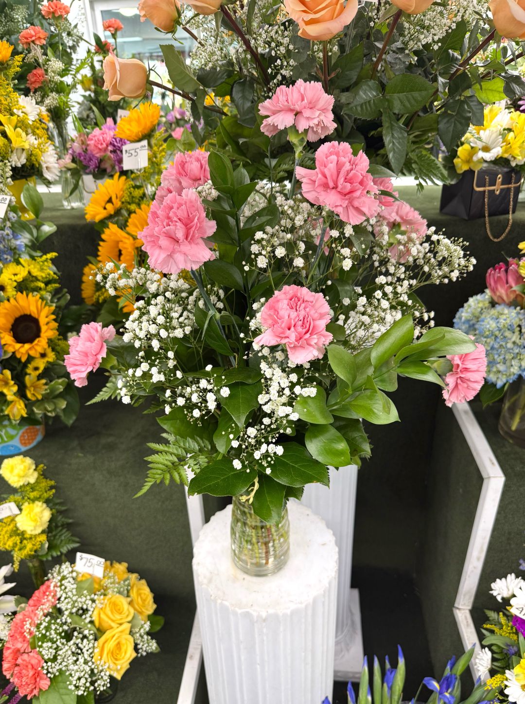 Dozen Pink Carnations Arrangement In the Cooler