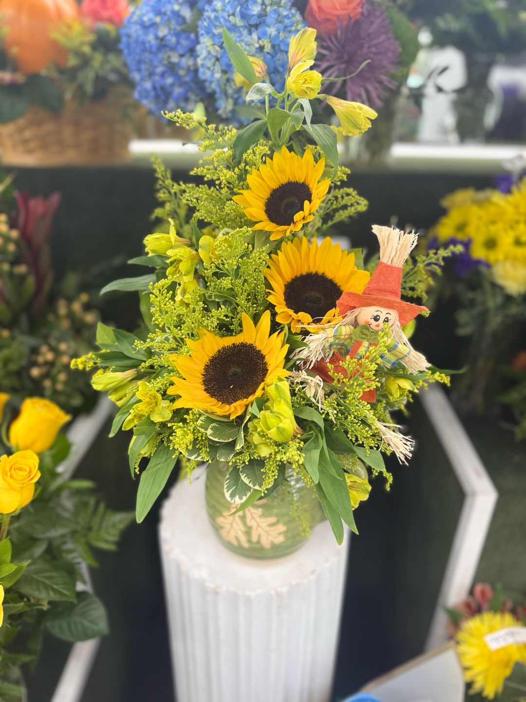 Sweet Scarecrow Pitcher Arrangement In the Cooler