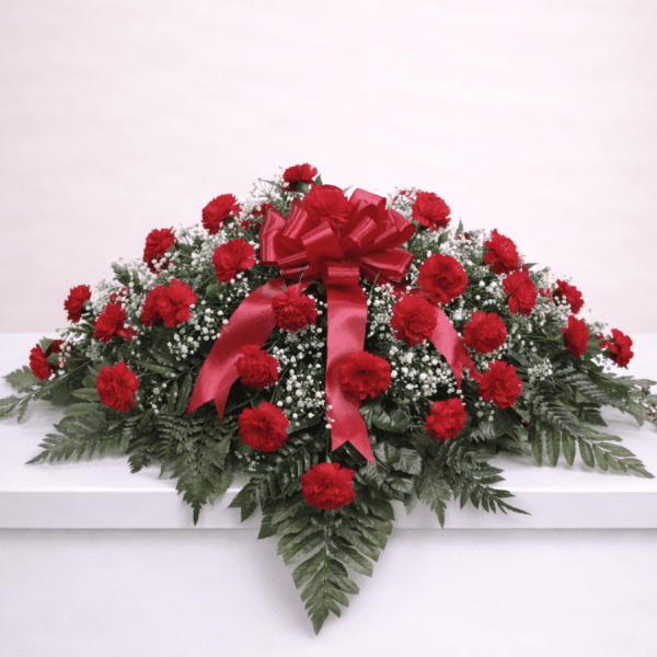 classic-carnation-casket-spray-dibella-flowers.png