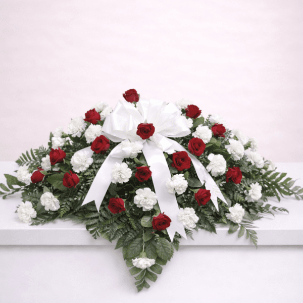 crimson-and-ivory-casket-spray-dibella-flowers.png