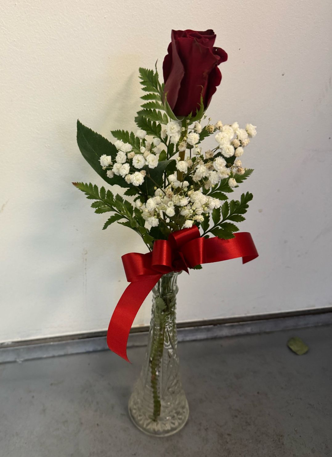 Single rose bud. vase