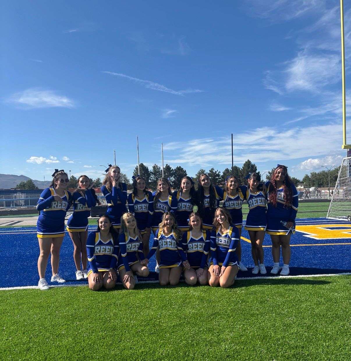 Reed High Cheer Team Stunting