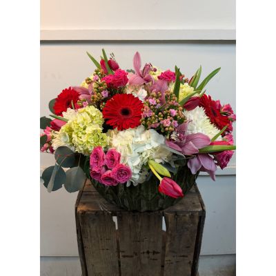 Colony Florist & Gifts Franklin Lakes - Just like the name, an overflowing bouquet of blooms emphasizing a lot of love! 
Container may vary