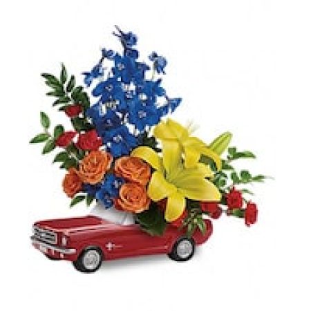 My Lady's Florist Westland - Look what just cruised into town! It's his dream car, bursting with bold blooms to remind him just how special he really is, on Father's Day and all year long. Hand-painted in classic poppy red, this fun-filled ceramic Ford Mustang is a one-of-a-kind collectible gift he'll love showing off to friends and family!