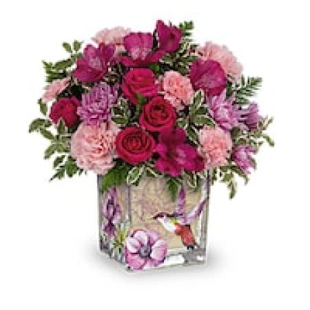 My Lady's Florist Westland - Inspired by a vintage flea market find, this charming glass cube is adorned with delightful botanical hummingbird imagery and filled with an equally enchanting rose bouquet.