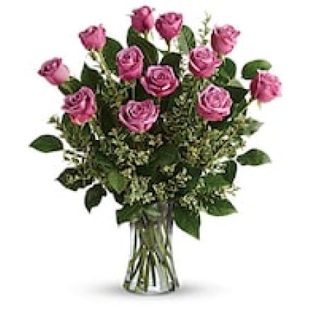 My Lady's Florist Westland - A gorgeous greeting for any occasion, this lovely lavender bouquet features one dozen radiant roses with lush greens in a classic glass vase.\n