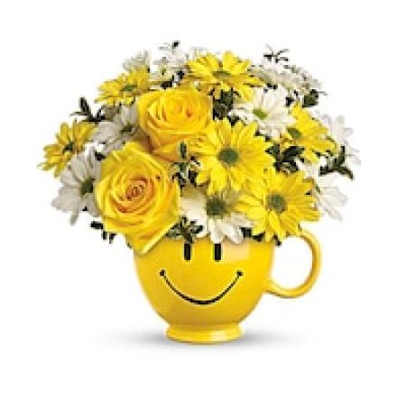 My Lady's Florist Westland - There are probably a million reasons this is such a popular bouquet. Of course, there are probably just as many reasons to send this cheerful arrangement. Full of happy flowers, this ceramic happy face mug will bring smiles for years to come. Especially when filled with that first cup of morning coffee or cocoa!