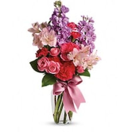 My Lady's Florist Westland - Someone you know (or want to know!) will jump for joy when she receives this charming bouquet. Soft and feminine colors, flowers and textures are all wrapped up in one pretty package.