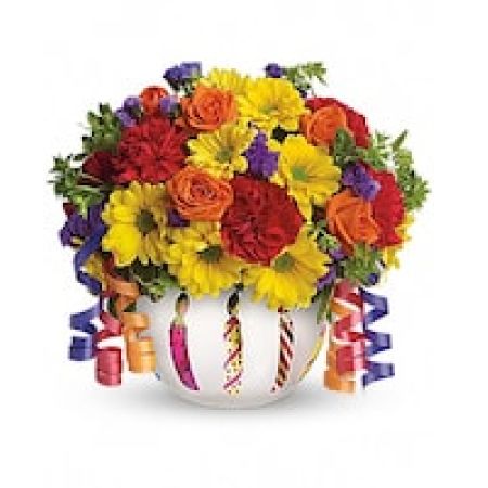My Lady's Florist Westland - Birthday wishes can come true even before the cake is served when you send this brilliant arrangement! Bright flowers fill a frosted glass bowl that's adorned with a shiny birthday candle motif. It makes a beautiful party centerpiece and a thoughtful gift!