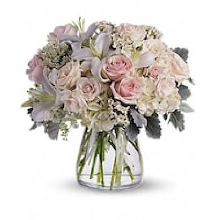 My Lady's Florist Westland - A whisper-quiet affirmation of love. Subtle shadings of pink and white roses, lilies and delicate Queen Anne's lace in a simple, elegant vase.