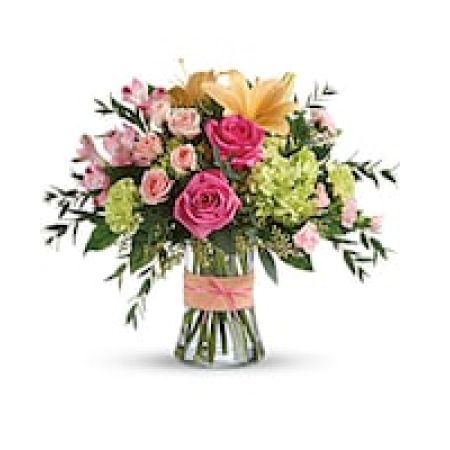 My Lady's Florist Westland - Go ahead, make them blush! This luxurious bouquet of roses, lilies and hydrangea in fresh shades of pink, peach and green is sure to put some cheerful color in their cheeks! The delicate ribbons dress up the graceful keepsake vase.