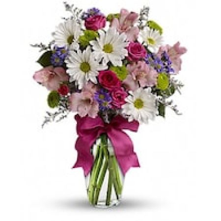 My Lady's Florist Westland - Looking for the prettiest bouquet in town? We've got the perfect all-around choice - a mix of blooms in breezy shades of pink, white, lavender and more, all tied up with a big pink bow! A great way to make someone smile.