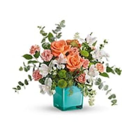 My Lady's Florist Westland - Inspired by the warm peach skies and crystal blue waters of a tropical sunset, this fun-filled rose bouquet adds a splash of happiness to any occasion! 