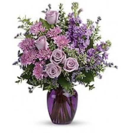 My Lady's Florist Westland - Capture the magic of togetherness with this bountiful bouquet of enchanting lavender roses. Artfully arranged in a glass vase, its twilight hues are sure to brighten anyone's day!