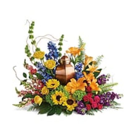 My Lady's Florist Westland - Like a radiant rainbow on a gray day, this colorful bouquet of hydrangea, roses, and sunflowers brings a bright light of hope to the cremation urn and celebration of life.\n
