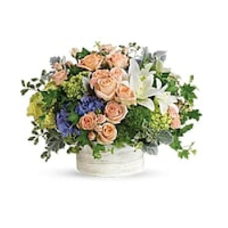 My Lady's Florist Westland - Intoxicating in its natural beauty, this wildly chic bouquet of pale peach roses and midnight purple hydrangea, arranged in a stylish white ceramic cylinder, is a breathtaking arrangement for any and all occasions.