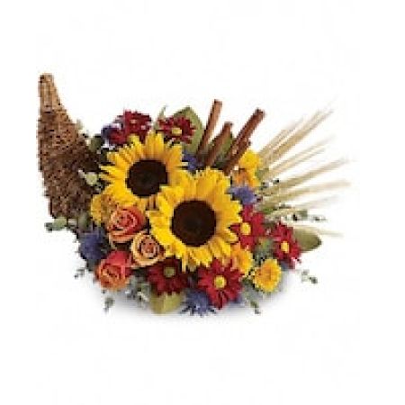 My Lady's Florist Westland - Along with joy, this cornucopia carries an abundance of beautiful fall flowers and foliage. A stunning centerpiece or inviting entryway display, this beauty will be at home anywhere in the house.
