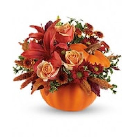 My Lady's Florist Westland - Fall in love with this charming arrangement. Orange roses, dark orange asiatic lilies, bronze button spray chrysanthemums and burgundy copper beech leaves fill our best-selling ceramic pumpkin. It's a versatile keepsake that adds character all season long.