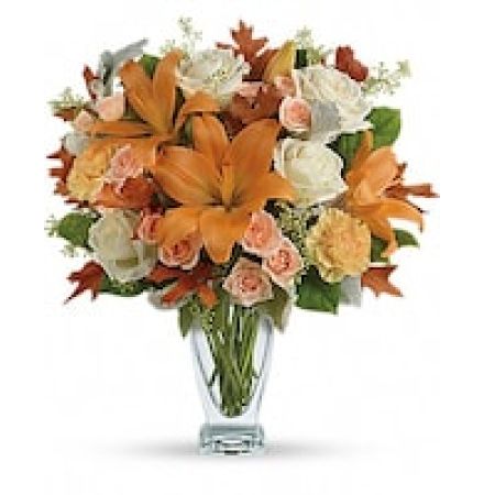 My Lady's Florist Westland - Add sophistication to the season with this gorgeous autumn arrangement. These striking lilies and roses are sure to brighten anyone's day.