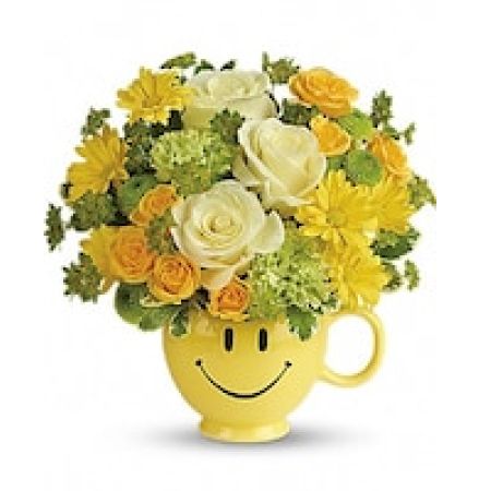 My Lady's Florist Westland - Put a smile on their face - and in their heart - with this happy as can be bouquet! Hand-delivered in a food safe mug for years of satisfied sipping, this cheerful gift of roses and mums spreads happiness wherever it goes