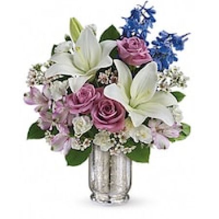 My Lady's Florist Westland - Make her dreams come true with this ethereal bouquet, presented in a stunning Mercury Glass hurricane. Beautiful snow-white lilies, lavender roses and a bright blue hint of delphinium create a dreamy declaration of your affection she'll never forget.