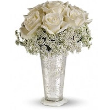My Lady's Florist Westland - Queen Anne's lace forms a delicate collar around radiant white roses inside an antiqued Mercury Glass Vase. Looks lovely next to the wedding guest book, on smaller cocktail tables, or on your beloved wife's boudoir.
