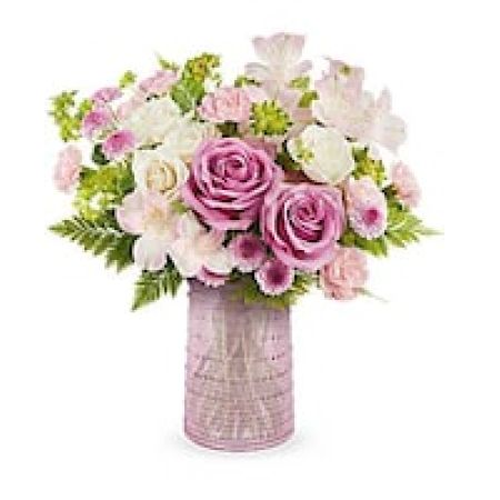 My Lady's Florist Westland - Celebrate Mom's love for elegant design with the Blush Blossoms Bouquet arranged in a pink glass carafe, featuring delicate beaded details and meeting FDA tableware standards for safely serving and storing drinks. Perfect for showcasing fresh blooms, this timeless keepsake adds a touch of beauty to her home year-round.