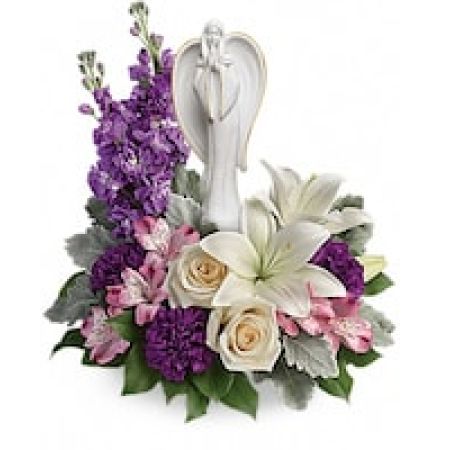 My Lady's Florist Westland - An elegantly unique expression of your deepest condolences, this majestic mix of crème, white and lavender blooms includes fragrant roses and lilies to refresh and rejuvenate their spirits. Nestled among the blooms is a graceful angel sculpture - a serene, spiritual keepsake they'll always treasure.
