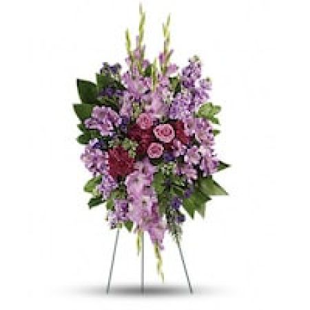 My Lady's Florist Westland - Console and comfort with this luxurious spray of lavender roses, alstroemeria and gladioli. It's a majestic way to remember the departed at the memorial service.